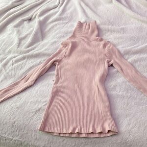 pink turtleneck top
